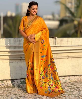 Yellow with multicolor accents  woven zari floral & peacock motifs  silk blend   3
