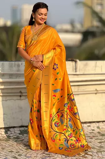 Yellow with multicolor accents  woven zari floral & peacock motifs  silk blend  