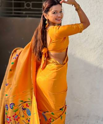 Yellow with multicolor accents  woven zari floral & peacock motifs  silk blend   4