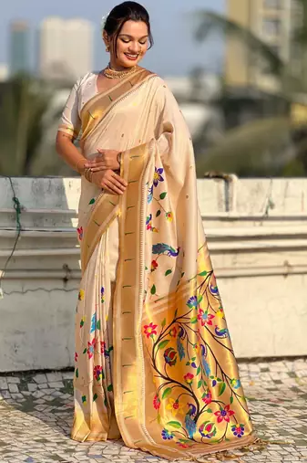 Off white with multicolor accents  woven zari floral & peacock motifs  silk blend