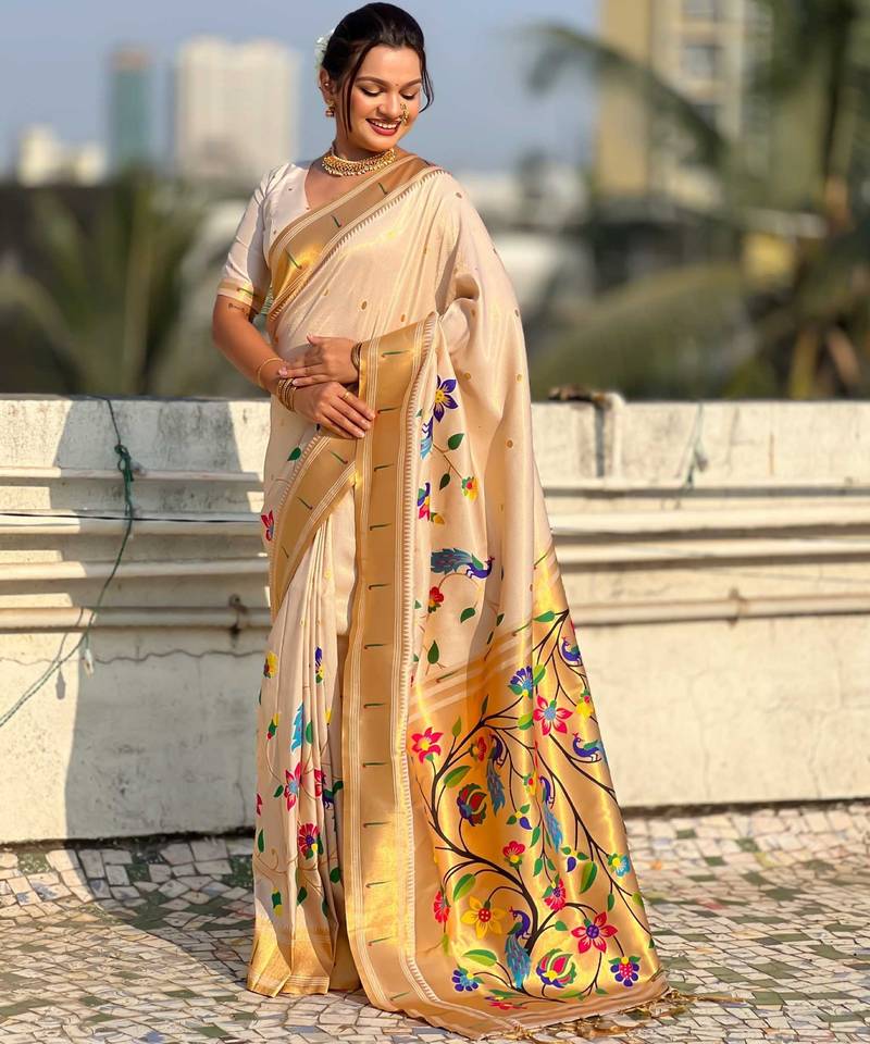 Off white with multicolor accents  woven zari floral & peacock motifs  silk blend