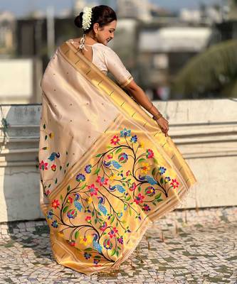 Off white with multicolor accents  woven zari floral & peacock motifs  silk blend 2