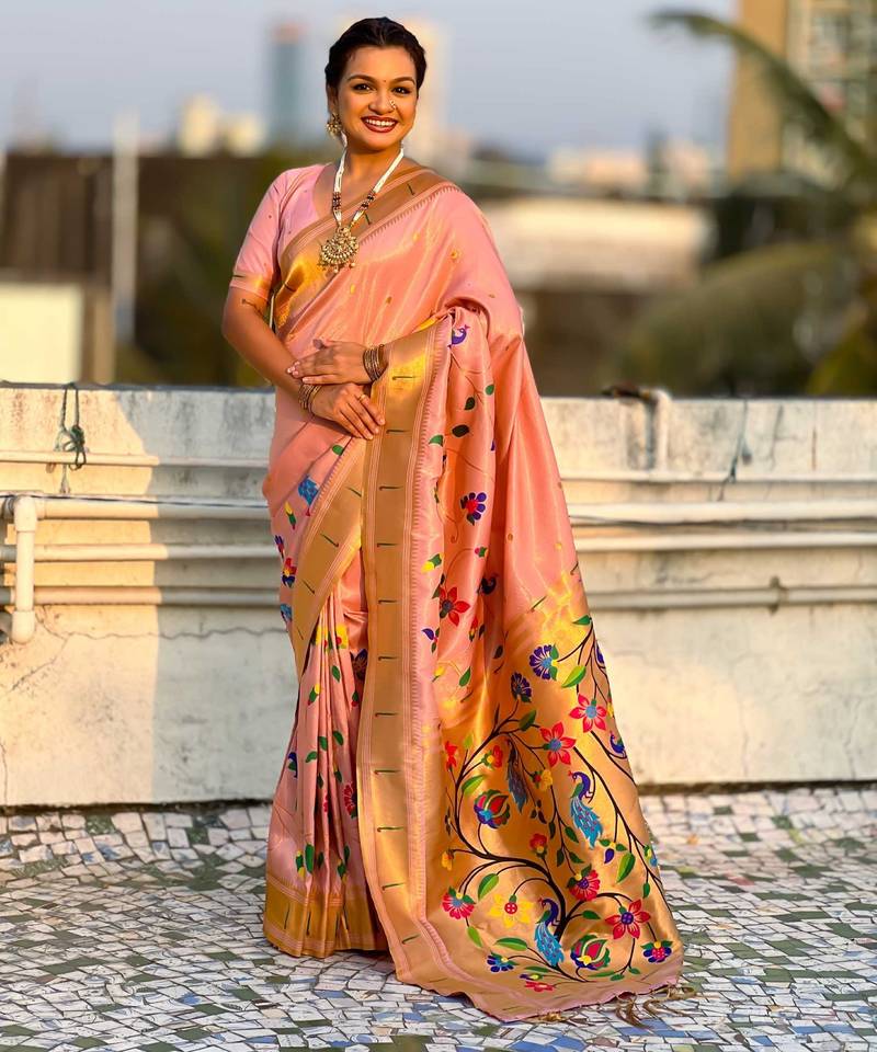 Peach with multicolor accents  woven zari floral & peacock motifs  silk blend  