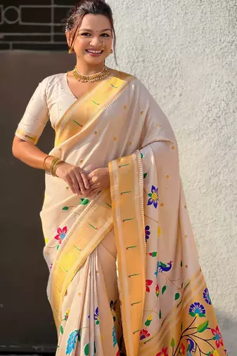 Off white with multicolor accents  woven zari floral & peacock motifs  silk blend