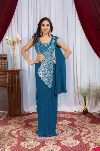 teal embroidered,thread & sequins work work faux georgette pre-stitched saree
