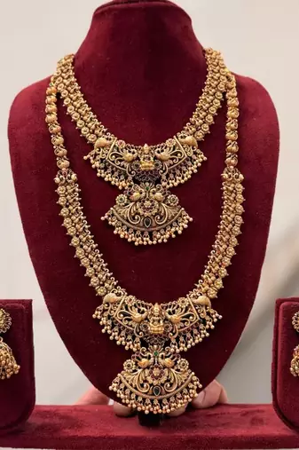 Exquisite handcrafted antique gold temple jewelry set - short choker, long haram & jhumka earrings