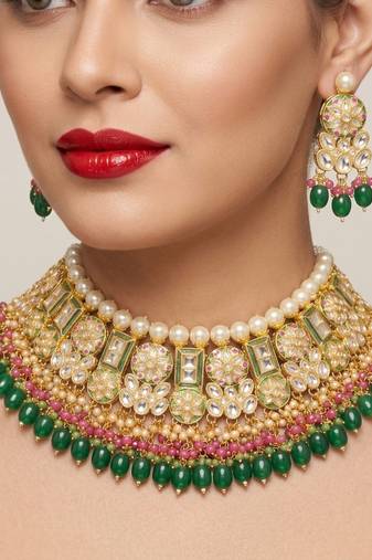 Exquisite gold-plated kundan bridal choker set with emerald green beads - traditional ethnic indian jewelry