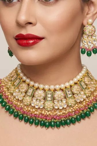 Exquisite gold-plated kundan bridal choker set with emerald green beads - traditional ethnic indian jewelry