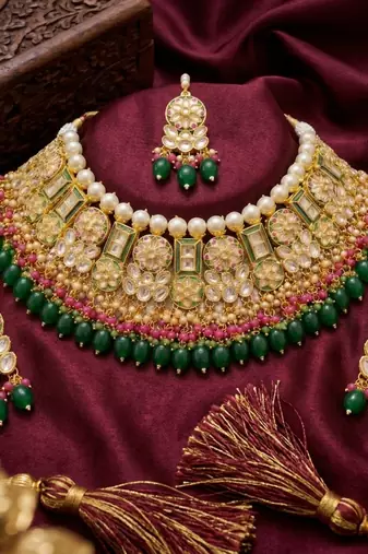 Exquisite gold-plated kundan bridal choker set with emerald green beads - traditional ethnic indian jewelry