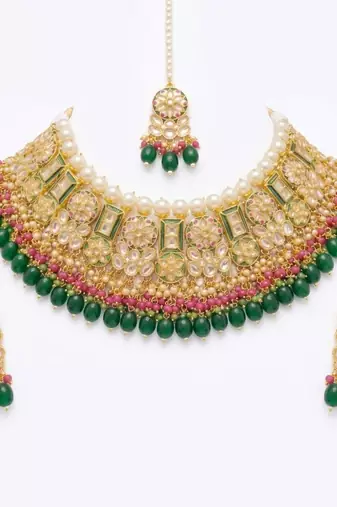 Exquisite gold-plated kundan bridal choker set with emerald green beads - traditional ethnic indian jewelry