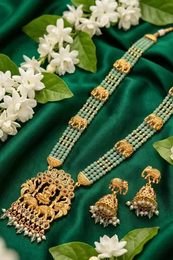 Traditional gold-plated temple jewelry set - handcrafted elephant motif green bead long Necklace :: & jhumka earrings