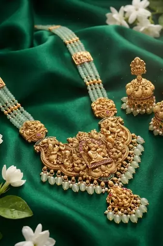 Antique gold-plated lakshmi temple Necklace :: set with green beads and jhumkas