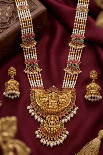 Exquisite temple jewelry: handcrafted gold-plated long pearl Necklace :: set with goddess pendant & jhumkas