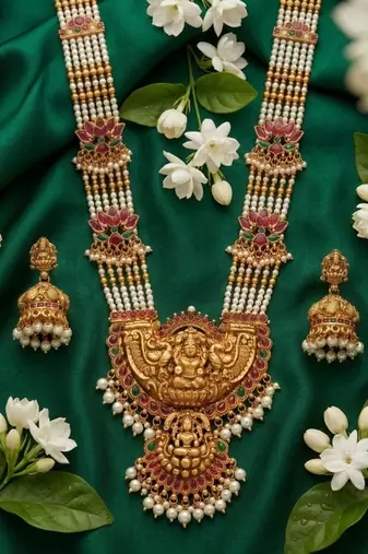 Exquisite temple jewelry: handcrafted gold-plated long pearl Necklace :: set with goddess pendant & jhumkas