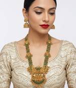 Stunning gold-plated temple jewelry set with emeralds | traditional haram & jhumkas | bridal & festival wear