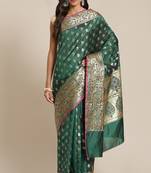 Banarasi silk blend saree in bottle green  colour with floral meenakari  work