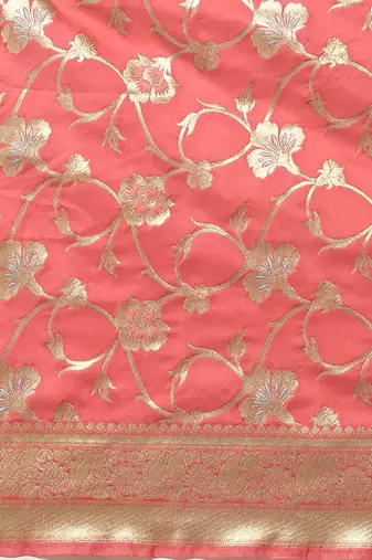 Banarasi silk blend saree in peach colour with floal zari jaal  work