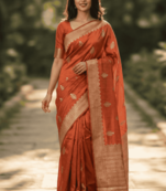Banarasi viscose silk saree in orange colour with floral zari meenakri work