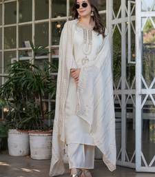 white embroidered kurta set