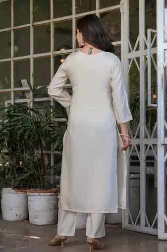 white embroidered kurta set