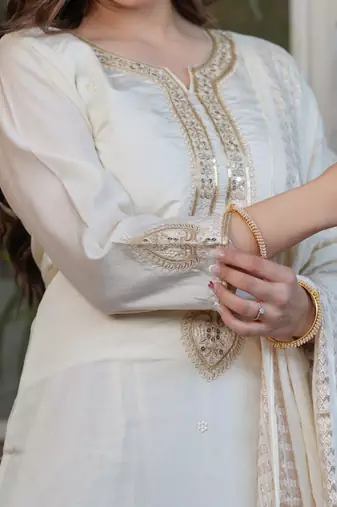 white embroidered kurta set