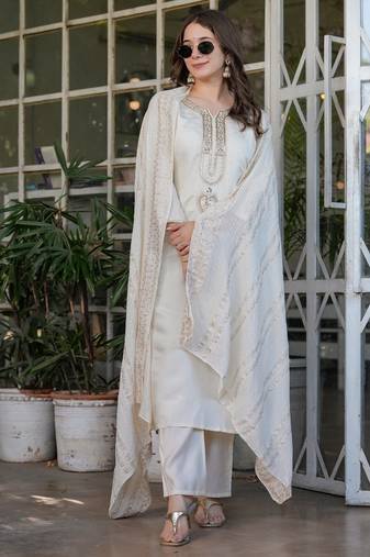 white embroidered kurta set
