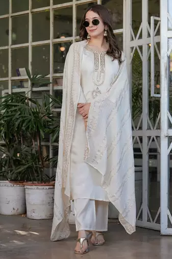 white embroidered kurta set