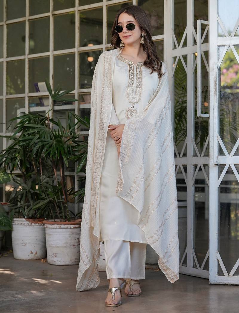 white embroidered kurta set