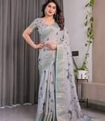 Soft handloom linen weaved with golden zari floral saree with tassels     includes 0.8m blouse