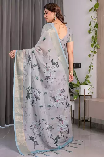 Soft handloom linen weaved with golden zari floral saree with tassels     includes 0.8m blouse