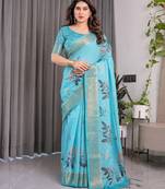 Graceful handloom linen weaved with golden zari saree with artistic floral print & tassels