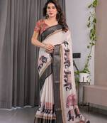 Designer floral print handloom linen weaved with golden zari saree with tassel pallu & blouse