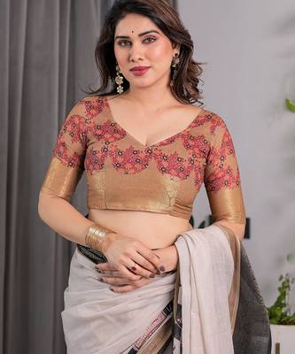 Designer floral print handloom linen weaved with golden zari saree with tassel pallu & blouse 4