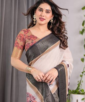 Designer floral print handloom linen weaved with golden zari saree with tassel pallu & blouse 5