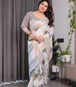 Stylish linen weaved with golden zari handloom saree with floral digital print and tassels     5.5m + 0.8m