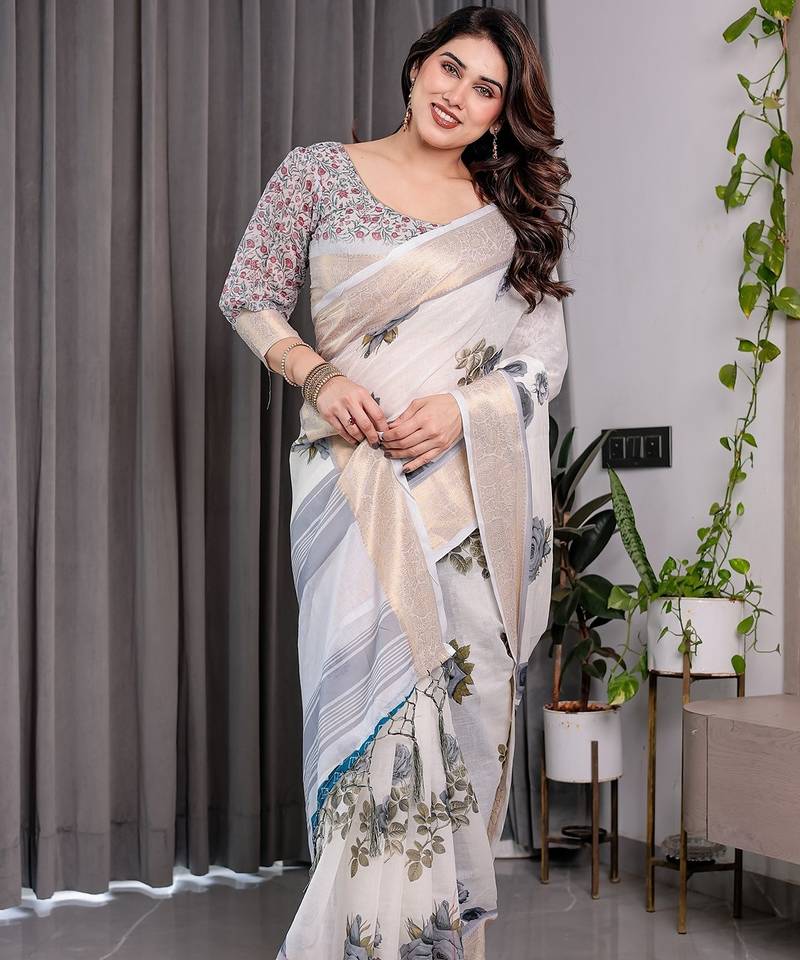 Stylish linen weaved with golden zari handloom saree with floral digital print and tassels     5.5m + 0.8m
