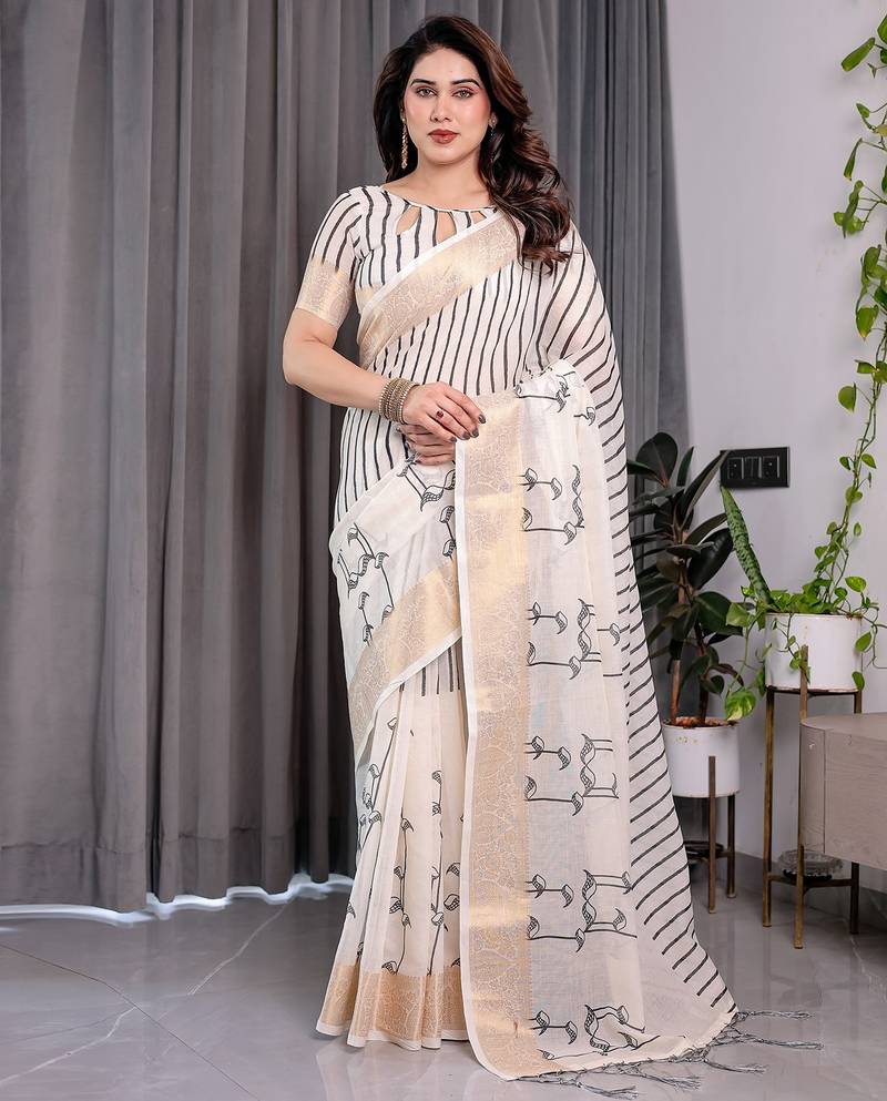 Festive ready handloom linen weaved with golden zari saree with floral artwork & matching blouse