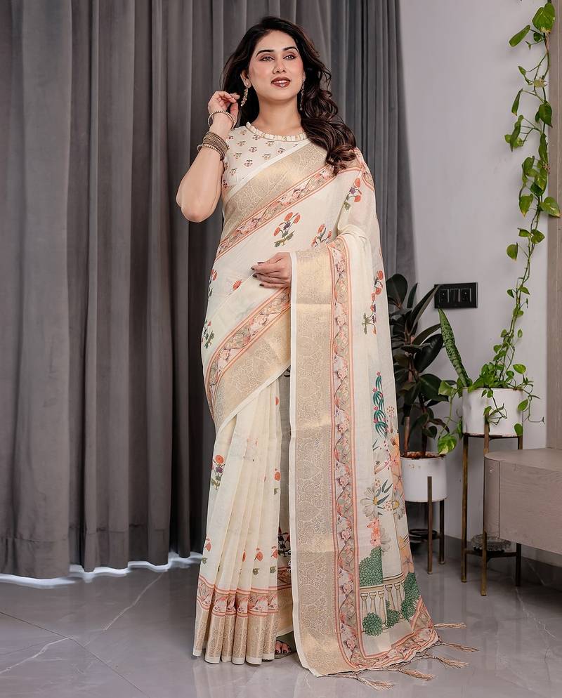 Elegant handloom linen weaved with golden zari saree with floral print & tassel edges     5.5m + 0.8m blouse