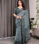 Floral printed linen weaved with golden zari saree in handloom weave with blouse piece     5.5m