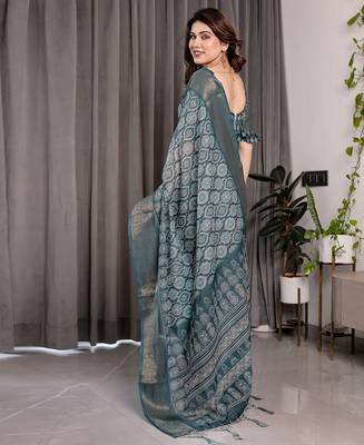 Floral printed linen weaved with golden zari saree in handloom weave with blouse piece     5.5m 3