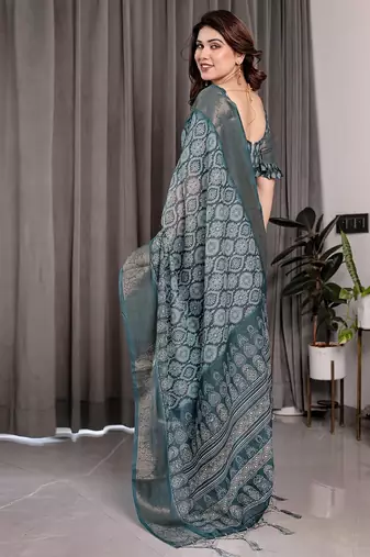 Floral printed linen weaved with golden zari saree in handloom weave with blouse piece     5.5m