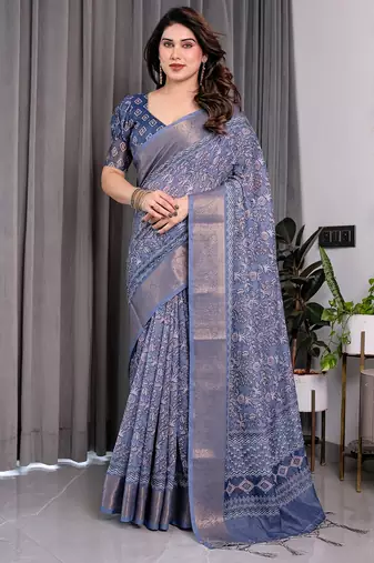 Traditional handloom linen weaved with golden zari floral saree with matching blouse & tassel detailing