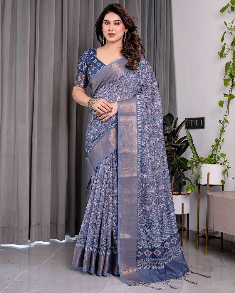 Traditional handloom linen weaved with golden zari floral saree with matching blouse & tassel detailing