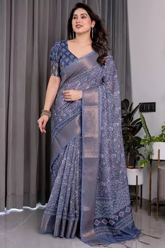 Traditional handloom linen weaved with golden zari floral saree with matching blouse & tassel detailing