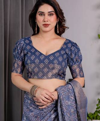 Traditional handloom linen weaved with golden zari floral saree with matching blouse & tassel detailing 3