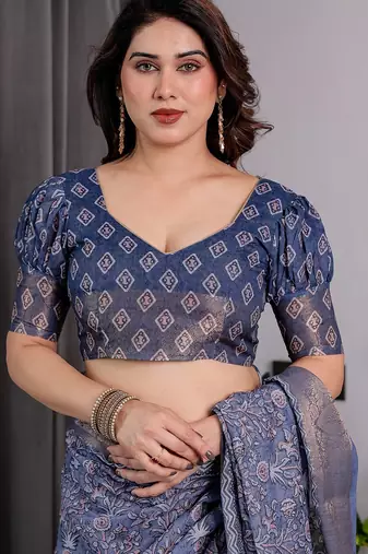 Traditional handloom linen weaved with golden zari floral saree with matching blouse & tassel detailing