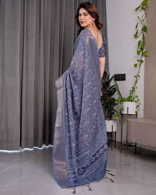 Traditional handloom linen weaved with golden zari floral saree with matching blouse & tassel detailing 4