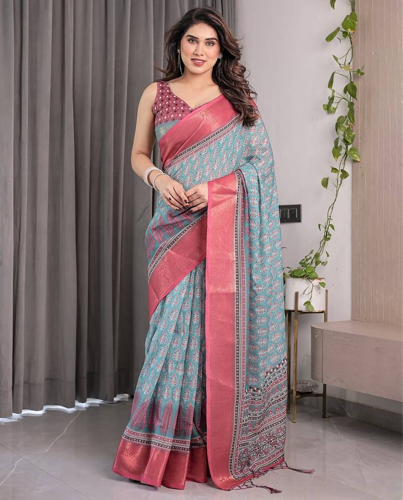 Soft handloom linen weaved with golden zari floral saree with tassels     includes 0.8m blouse