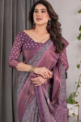 Graceful handloom linen weaved with golden zari saree with artistic floral print & tassels