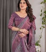 Graceful handloom linen weaved with golden zari saree with artistic floral print & tassels
